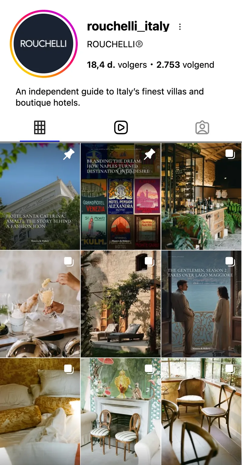 Het Instagramprofiel rouchelli_italy op een telefoon: 18,4 duizend volgers en een raster van villa's, interieurs en affiches